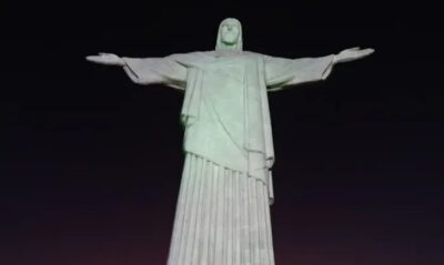 Cristo Redentor é iluminado com mensagens de campanha contra violência