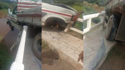 Caminhão fica pendurado em ponte sobre o Rio Grajaú